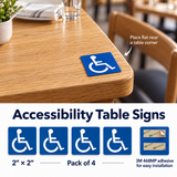 2 by 2 inch blue accessibility table sign placed flat near a table corner; pack of four with 3M 468MP adhesive backing.