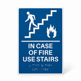 ADA Compliant Elevator Sign – "In Case of Fire Use Stairs," Tactile with Braille — Blue studio product view; SKU ICOF69U.