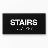 ADA Compliant Stairs Sign – 6"x3" Tactile with Braille — Black studio product view; SKU STR-0603-BLK.