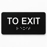 ADA Compliant To Exit Sign – 6"x3" Tactile with Braille — Black studio product view; SKU TOE-0603-BLK.